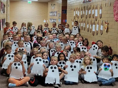 First Graders do fun Math Activity with Ghosts