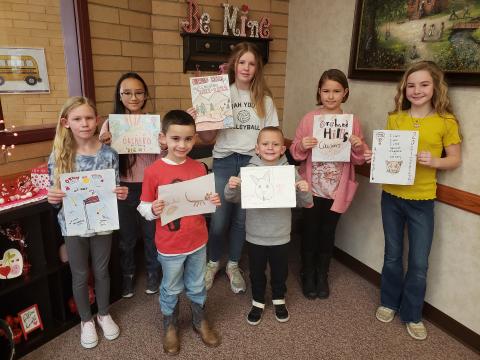 Yearbook Cover Contest Winners from each grade level